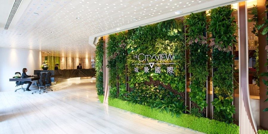 Luxurious lobby showcasing a stunning large vase that enhances the opulent atmosphere.